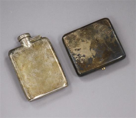 A George V silver hip flask and a silver cigarette case.